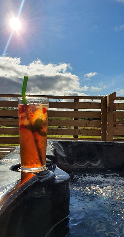 cool drink by hot tub.